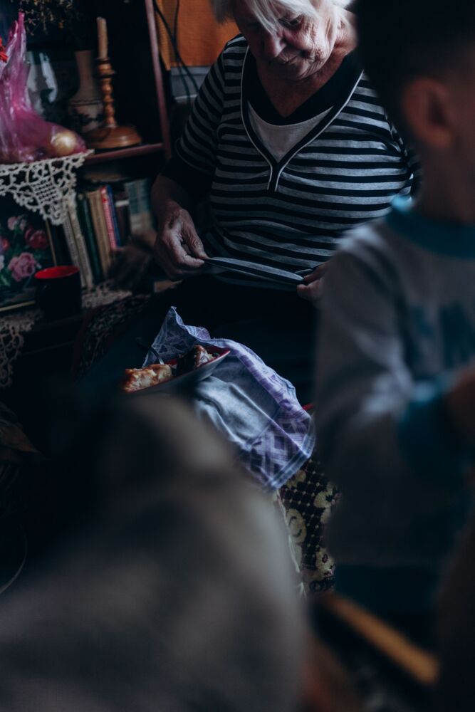 Two grandmothers and one grandson (6)