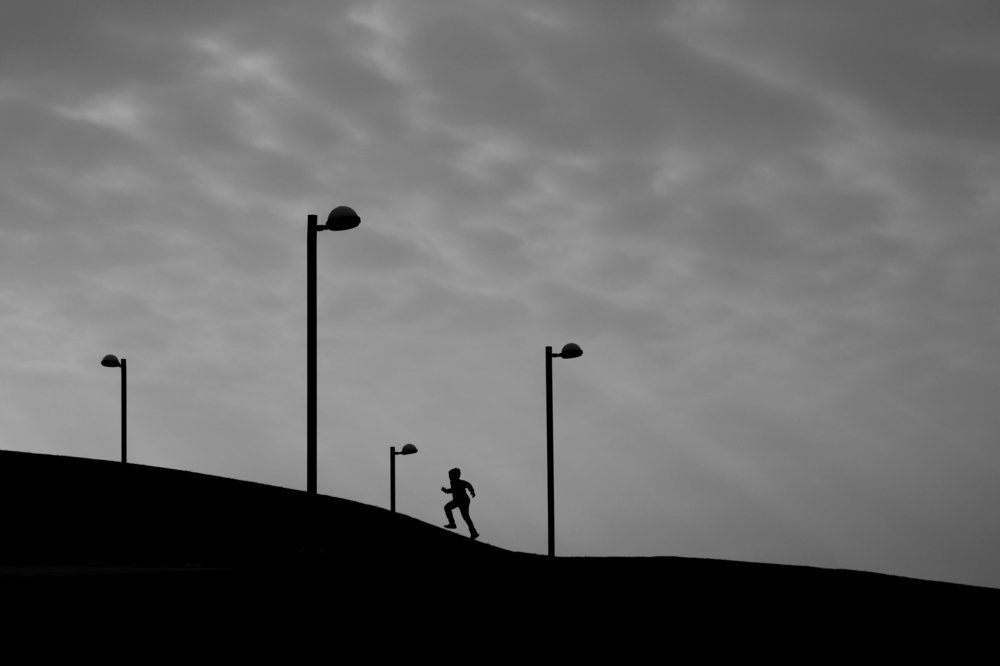 between the lampposts