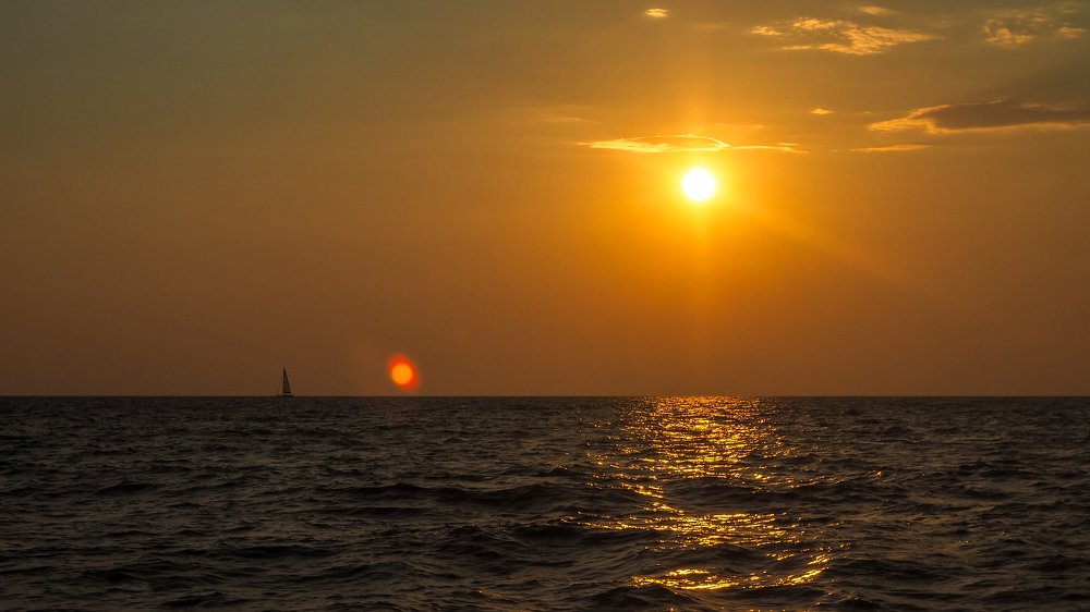 Парусник на закате, Италия