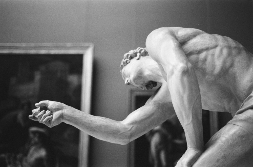 A Young Man Playing Knucklebones