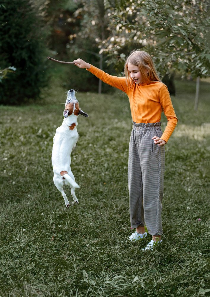 Girl, dog and autumn