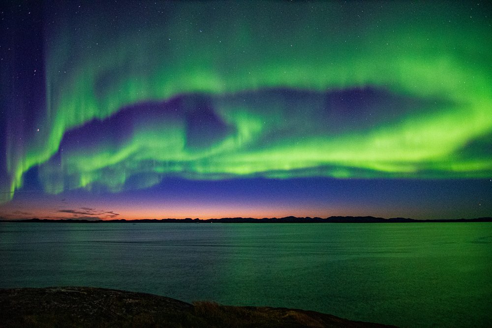 Sunset and Aurora Borealis.