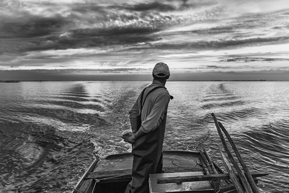 Fisherman in the lagoon