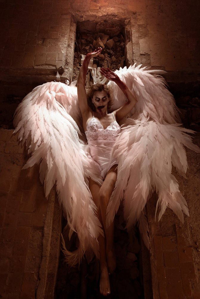 Падший ангел на кресте