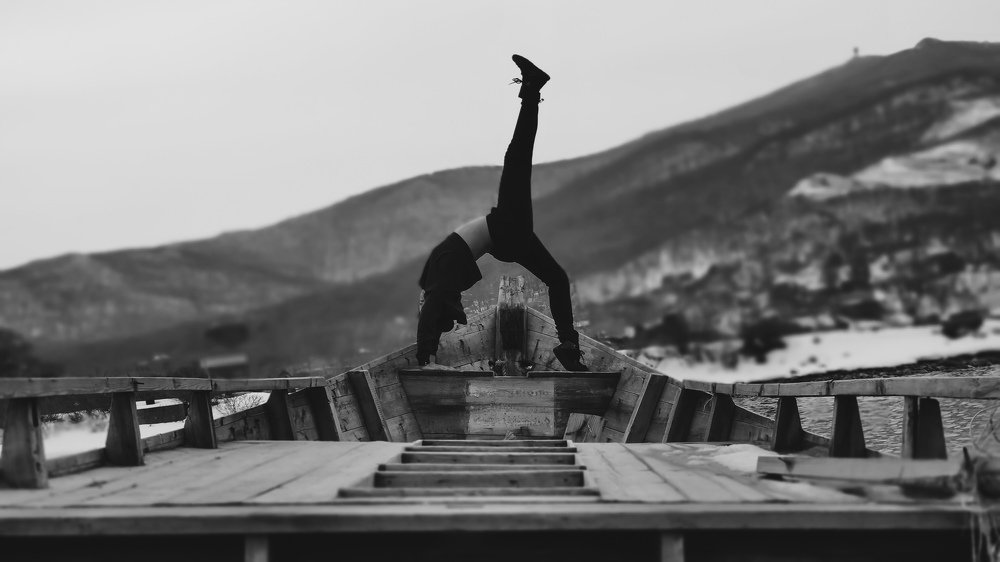 Backbend on the shore boat