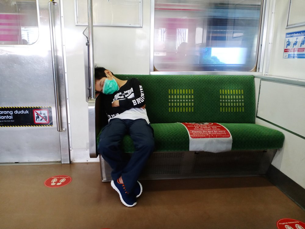 boy fell asleep on train