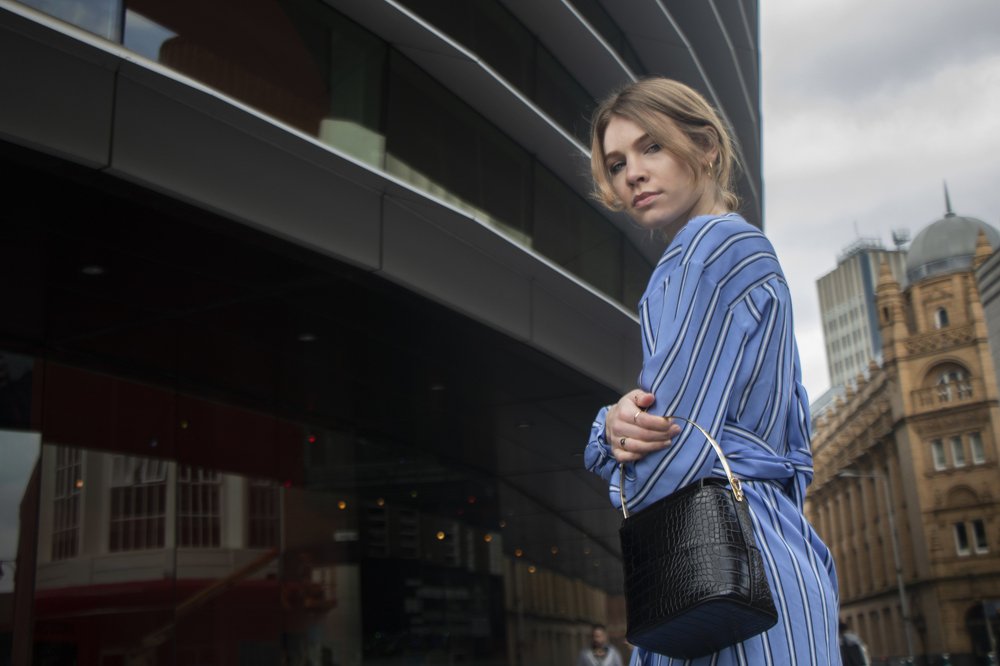 Anna in blue, striped dress