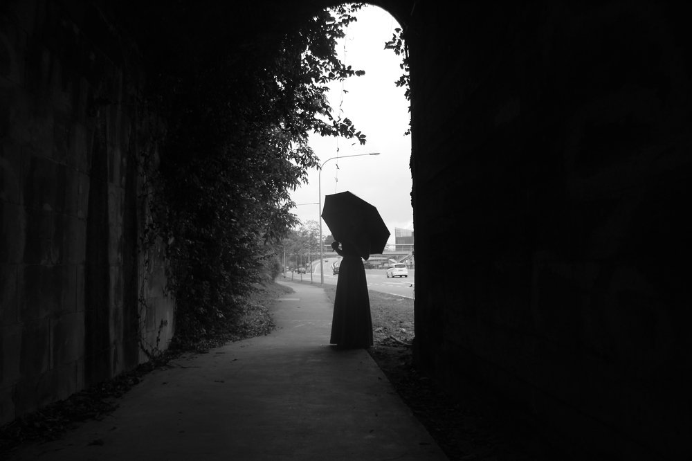 Lady under the bridge