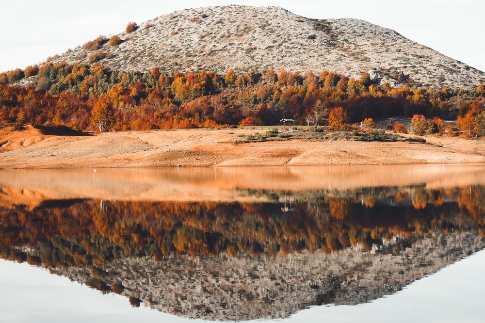 reflection of autumn in a mountain lake
