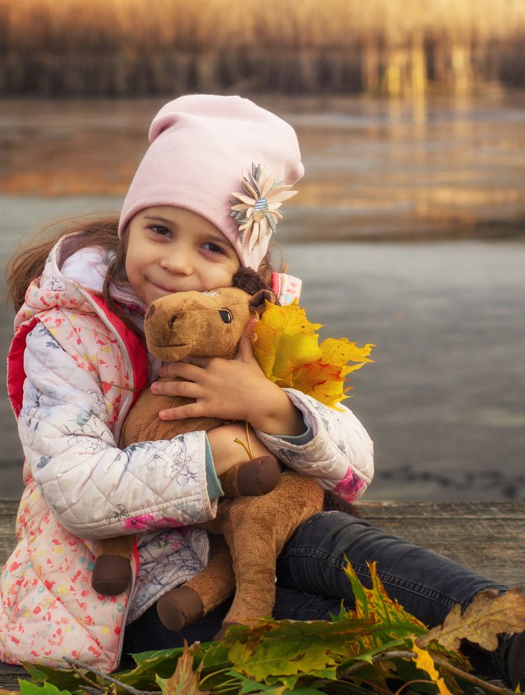 Girl with a soft toy