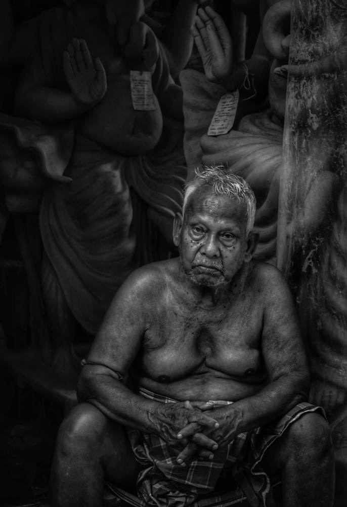 Tired face of Kumartuli Artist