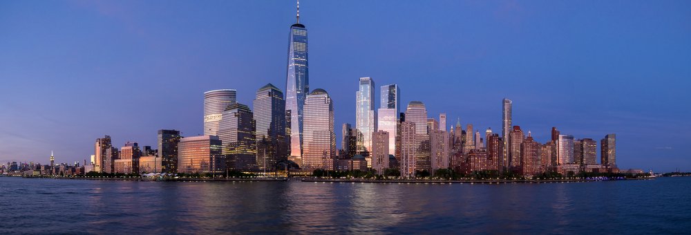 Sunset over Manhattan, New York, NY, USA from the Hudson river.