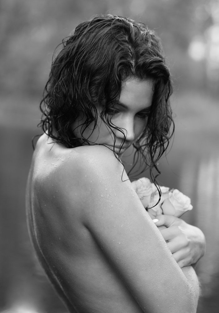 Girl in the lake with roses