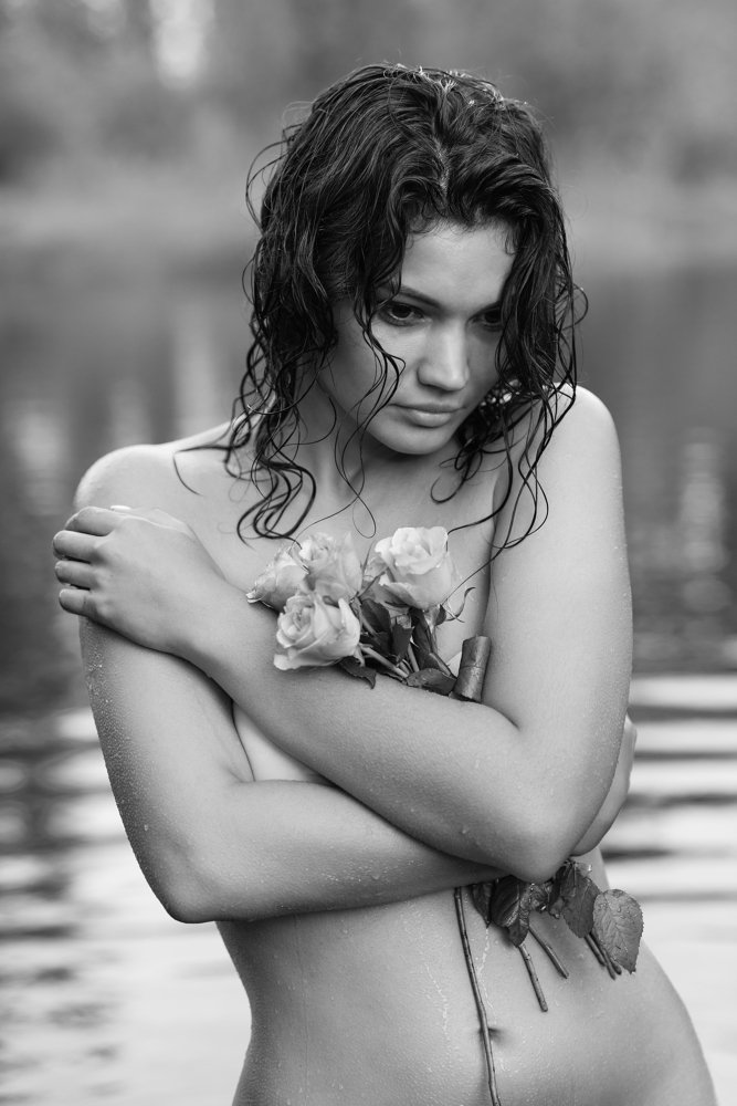Girl in the lake with roses