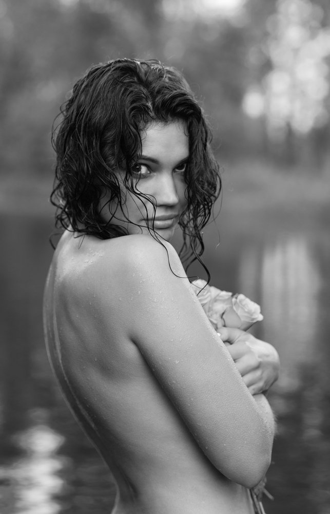 Girl in the lake with roses