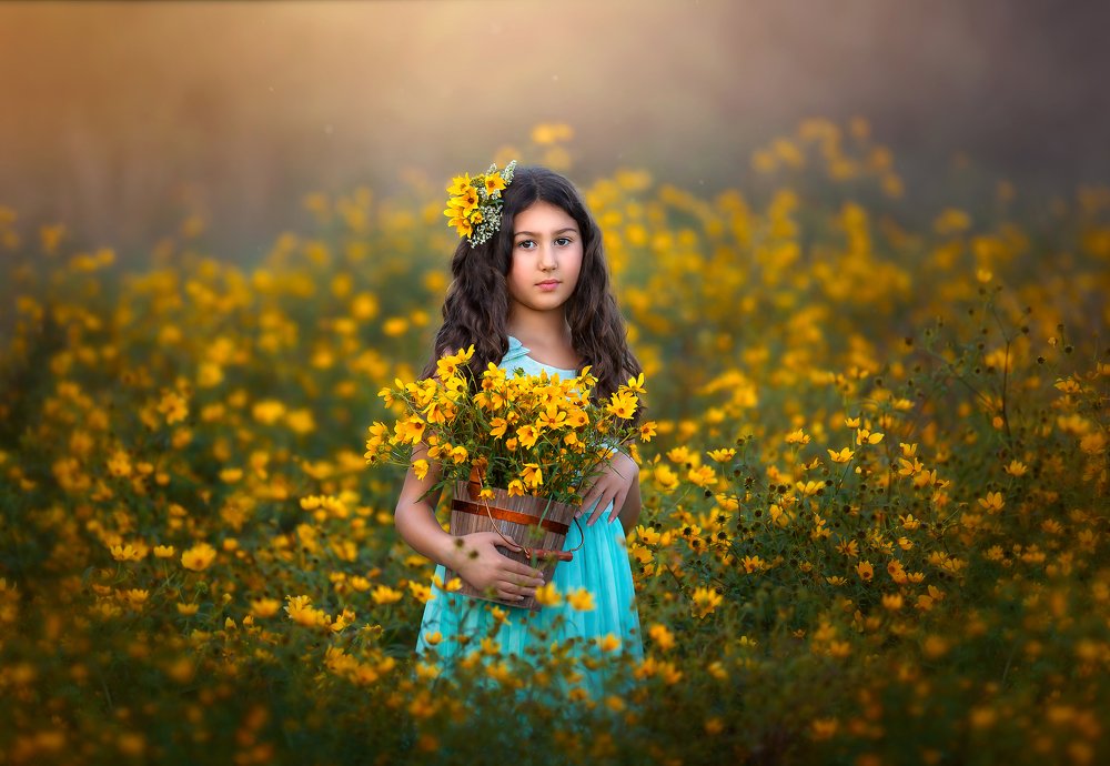 Girl in the yellow meadow