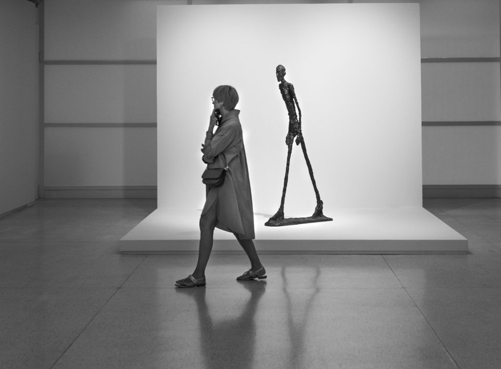 Woman, alone in the city