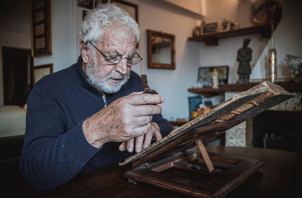 Old man reading a book