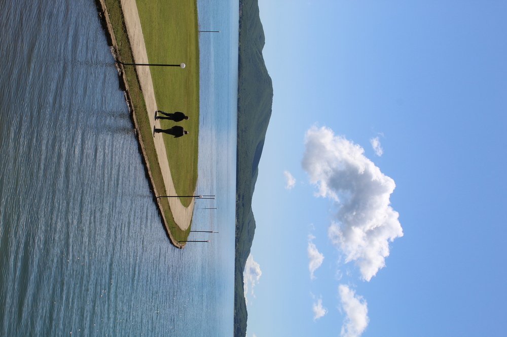 Walking by the lake .