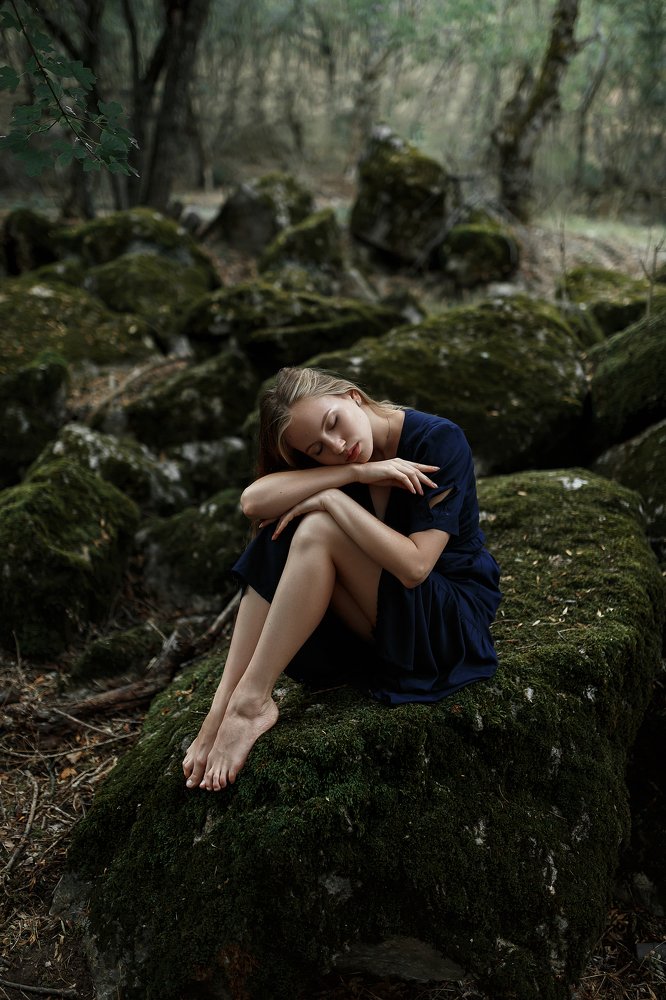 Girl in the forest before the rain