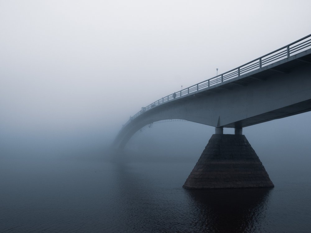 bridge on a foggy day.