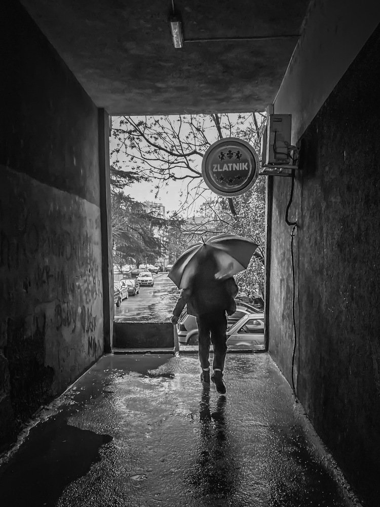 Motion with umbrella