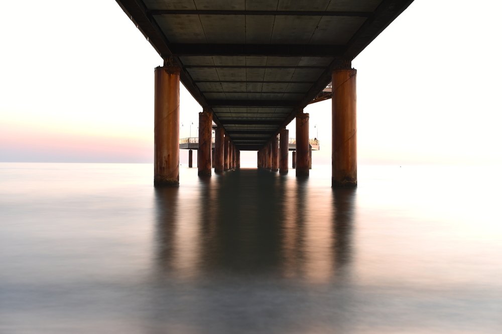 Sunset under the pier