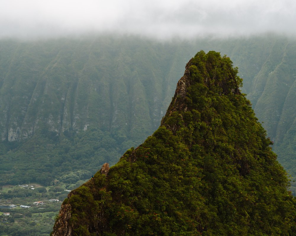 Can you spot the tiny brave man climbing towards the peak?