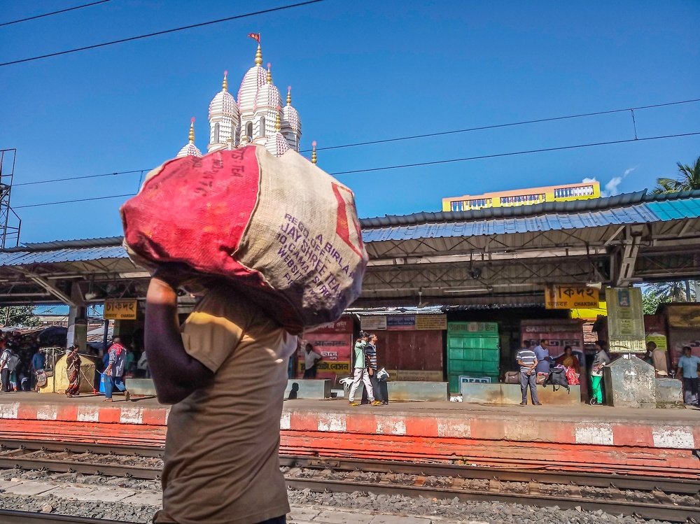 Carrying religion on his shoulders.