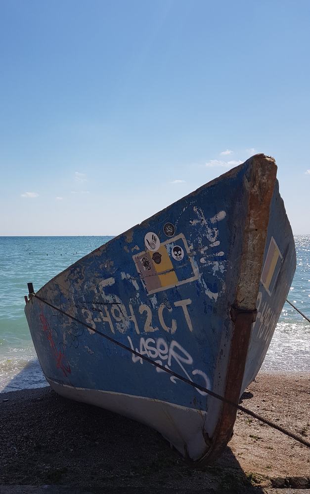 The boat on the seashore
