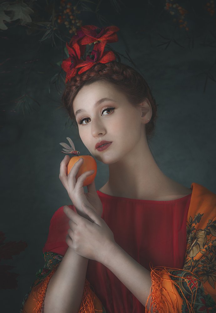 Girl with persimmon and dragonfly
