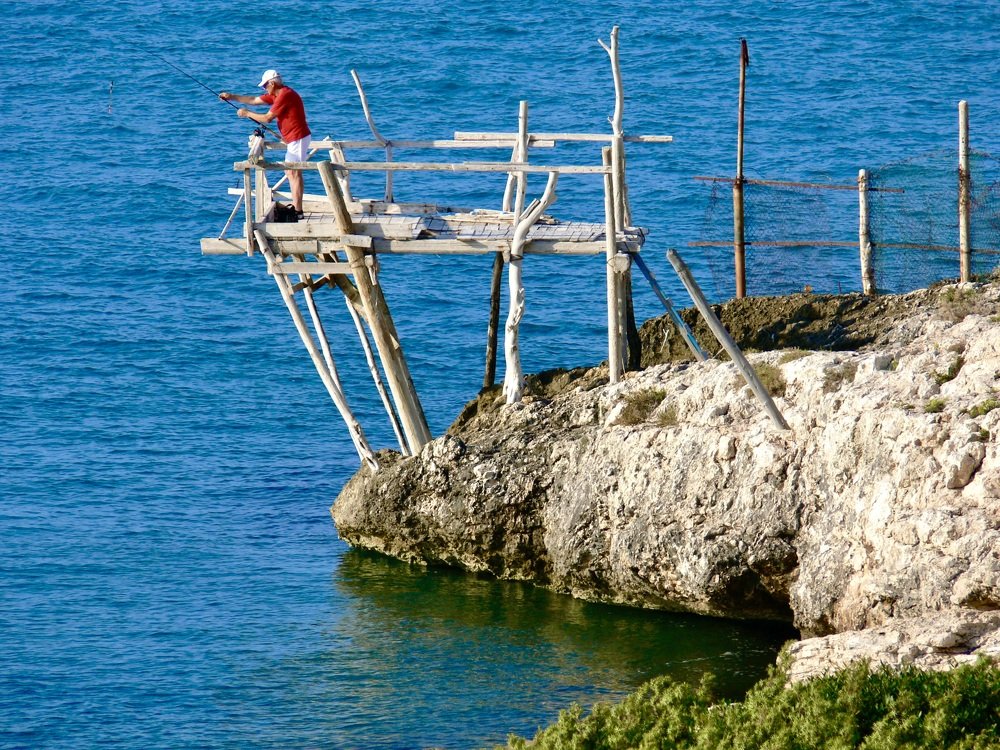 Fisherman on a Ledge