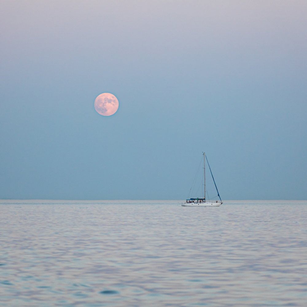 Sailing under the moon