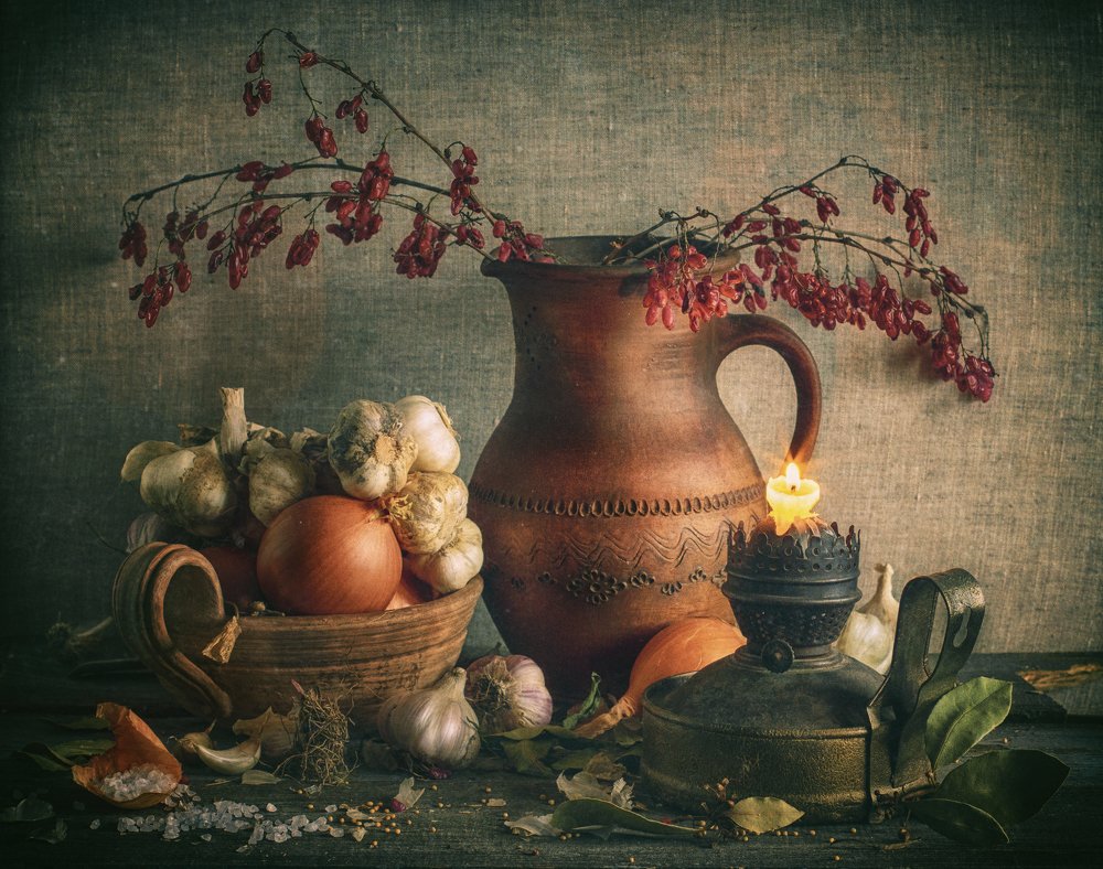 Still life with barberry branches and garlic
