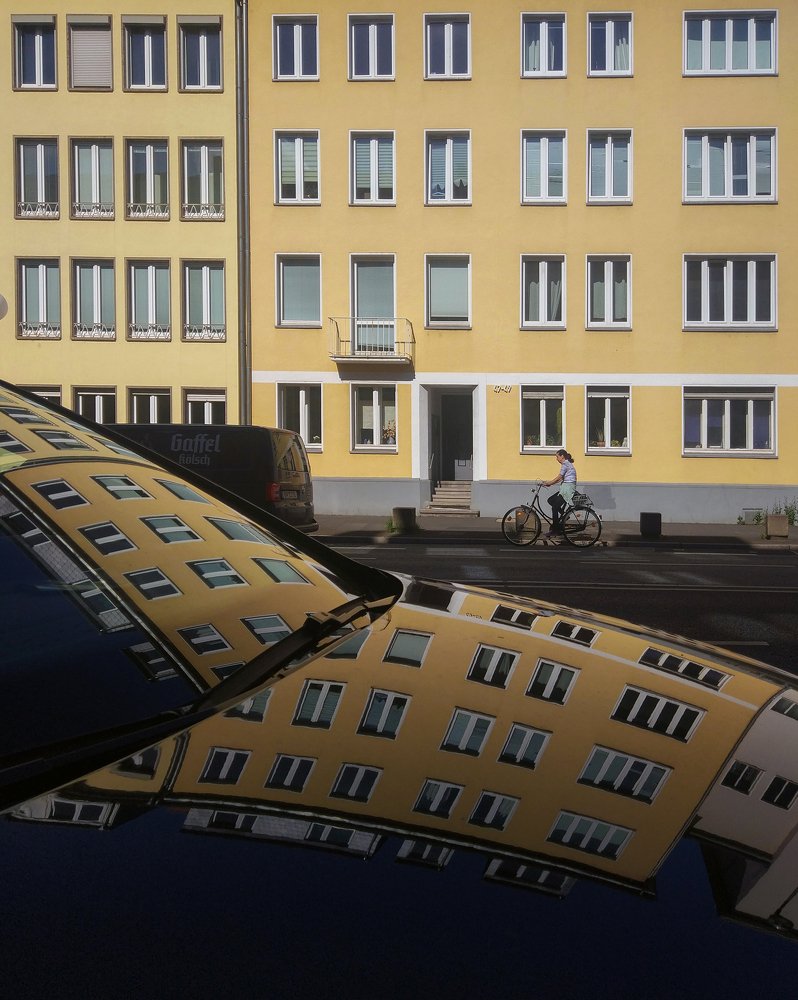 Reflected facade in shadow