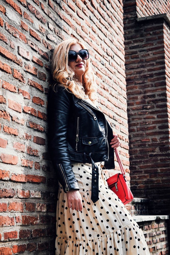 Posing on an Urban Wall