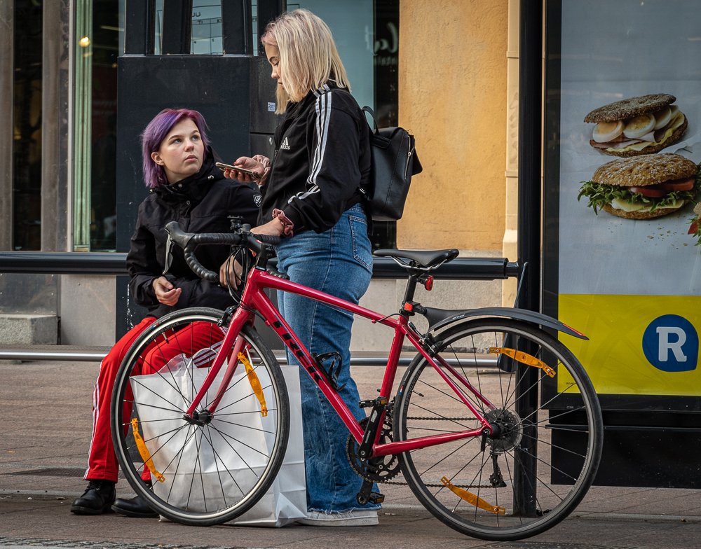 Girls and red bike