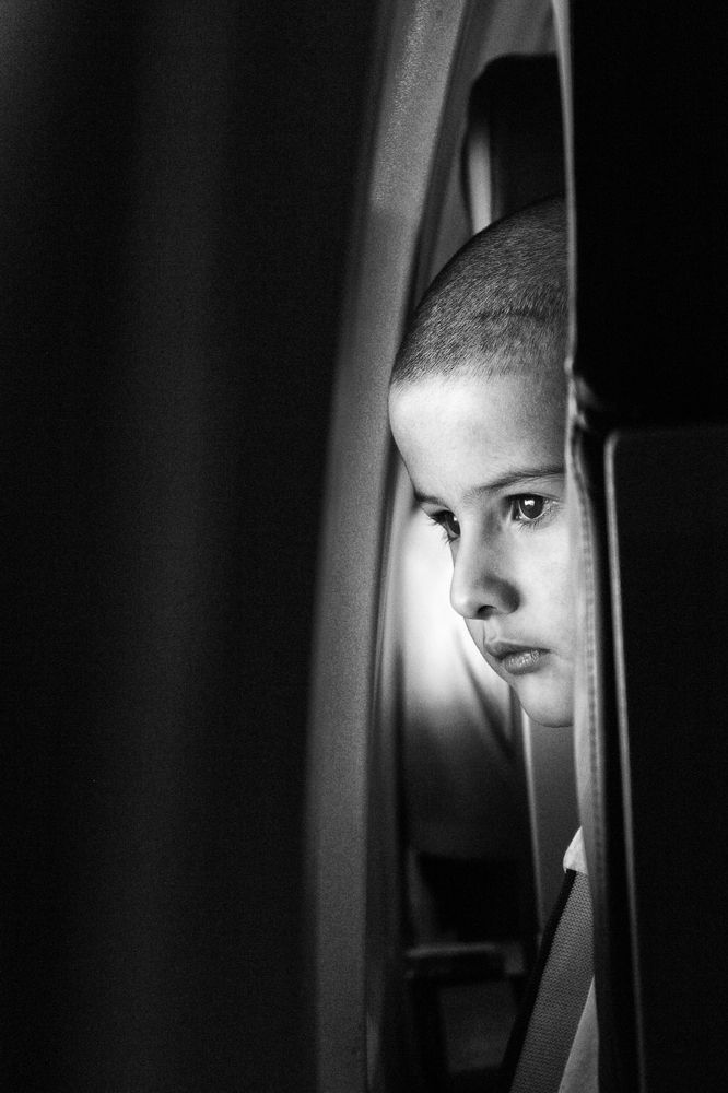 В самолёте.