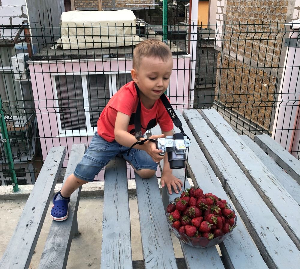 Юный фотограф