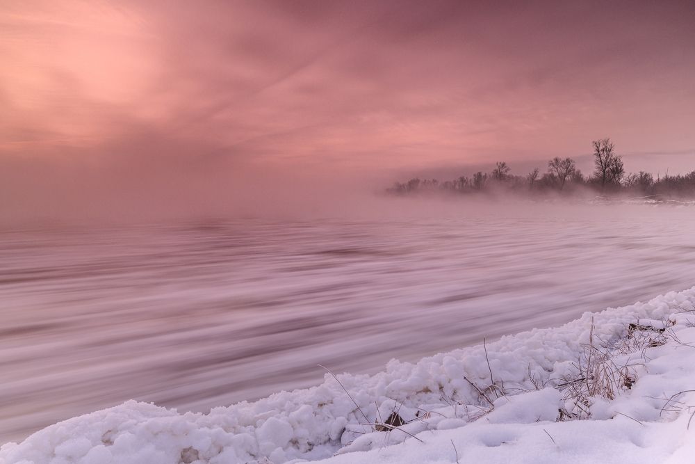 Fogs over Vistula during winter sunrise