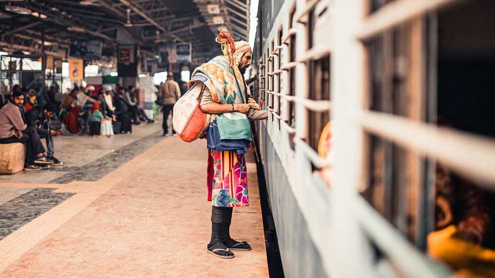 Man saying goodbye in the train