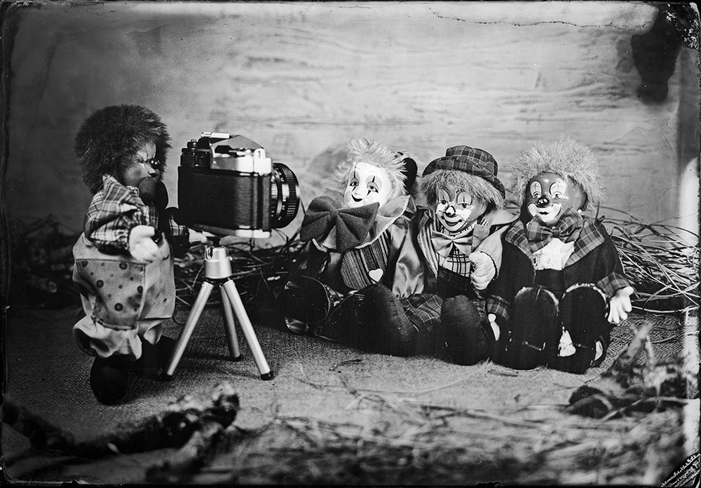 Clown takes pictures of clowns