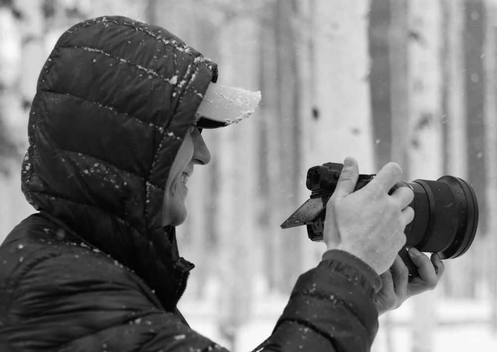 Человек с фотоаппаратом