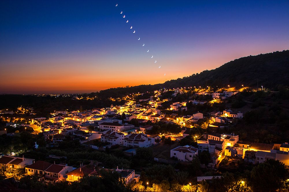 The waning moon dance over the village