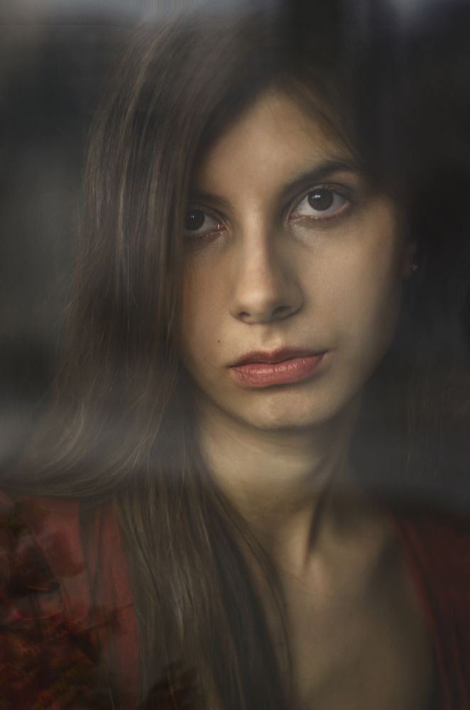 The girl behind the window