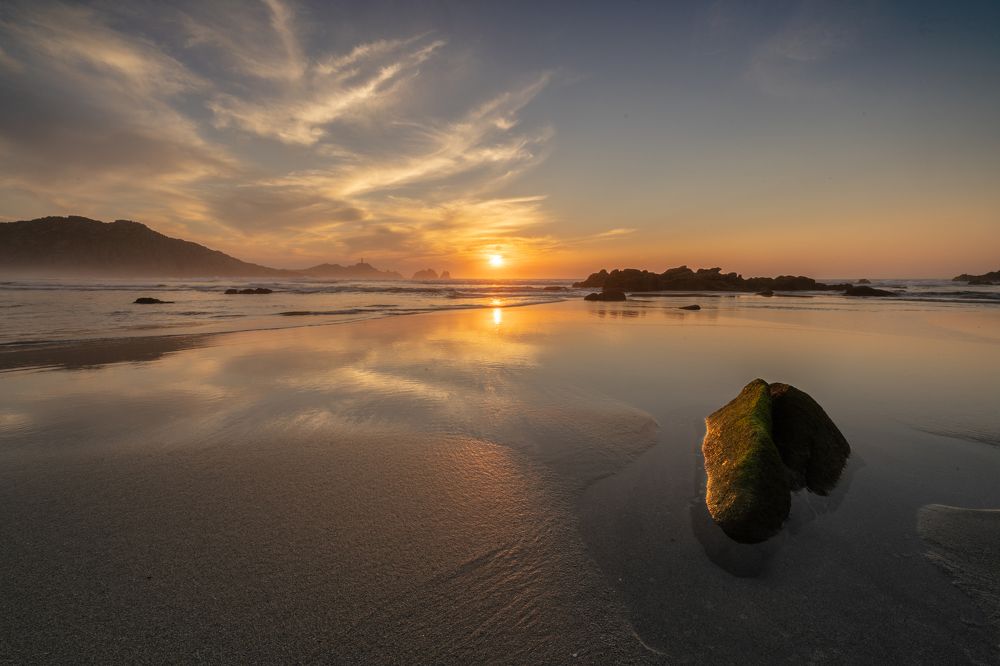 Sky, sea, sand and reflections