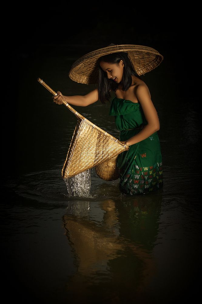 Gleeful fisherwoman