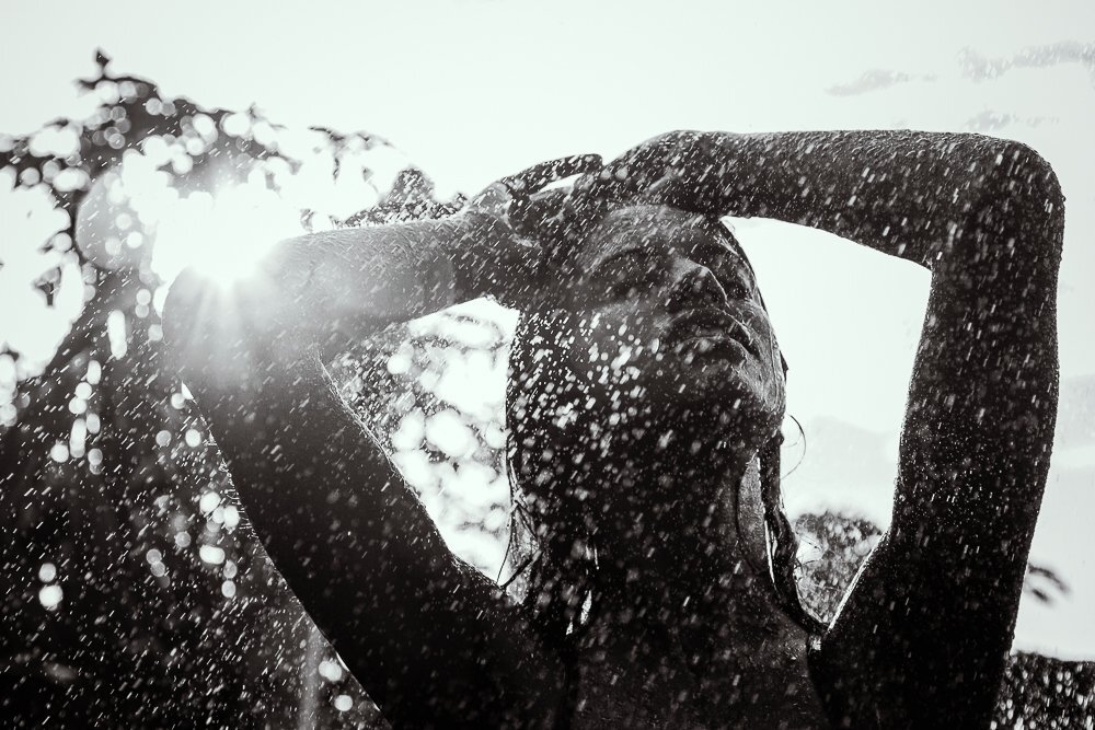 woman on the rain in bnw