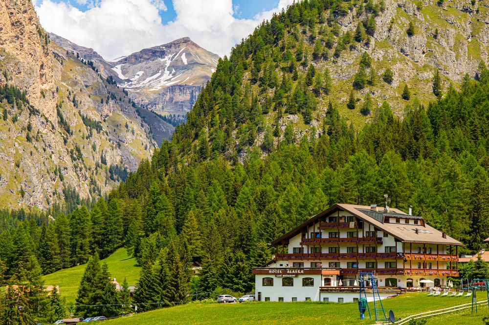 Dolomites - Beautiful panoramic sunset landscape at Gardena Pass, Passo Giau, near Ortisei. Stunning airial view on the top Dolomiti Alps Mountains from drone on summer day, Italy, south Tyrol Europe