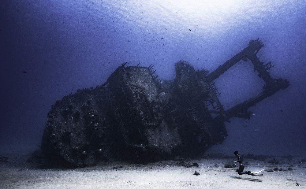 Floating man with his boat